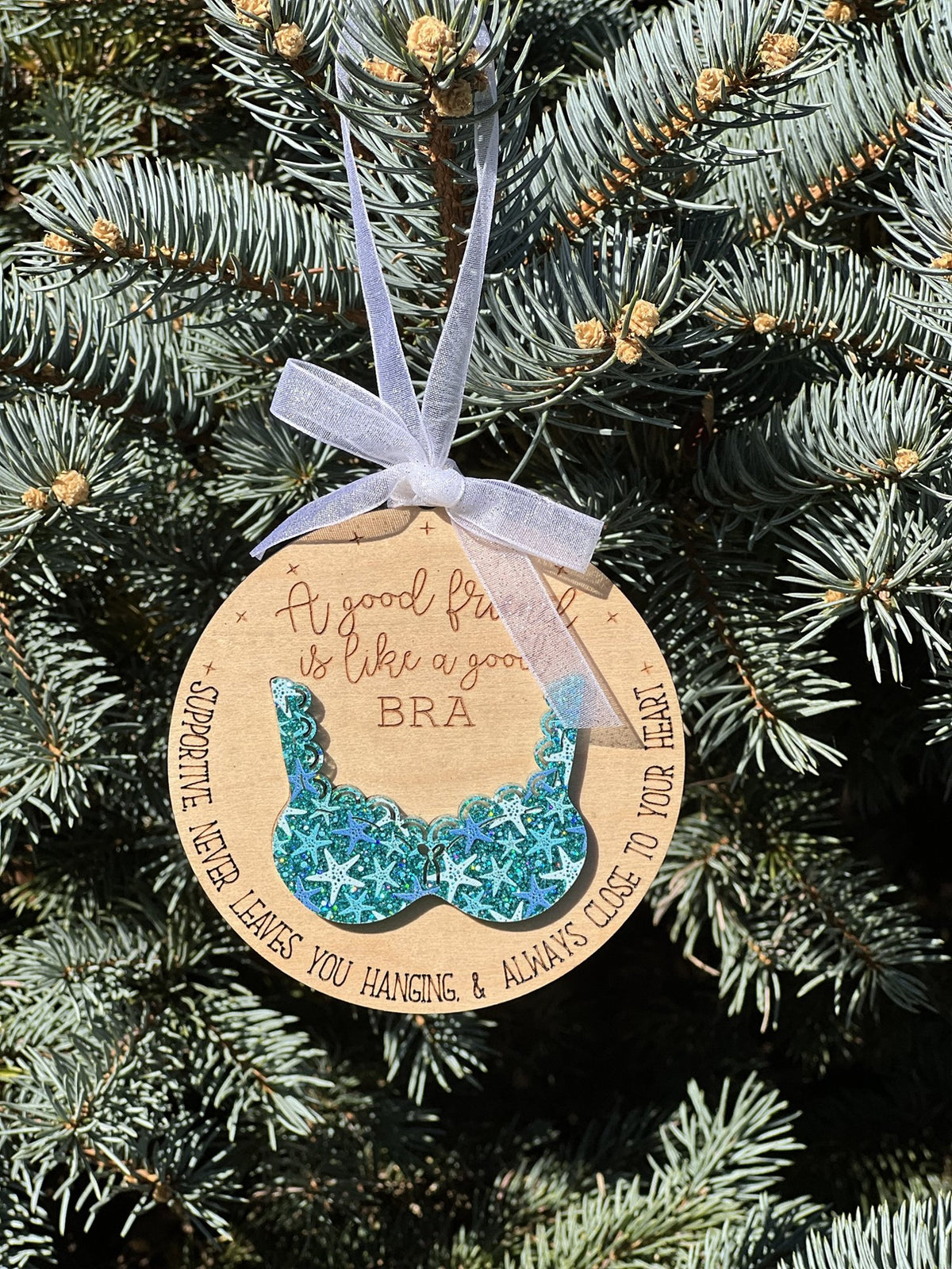 Friends are like bras ornament in teal with starfish