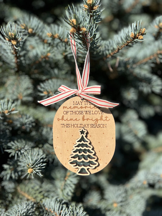 Memories shine bright ornament with red and white string